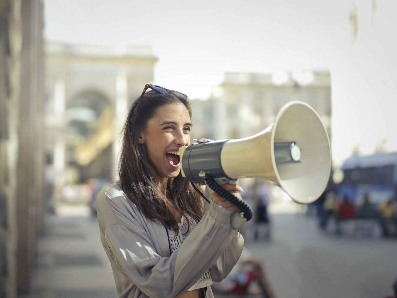 woman shouting a business manifesto