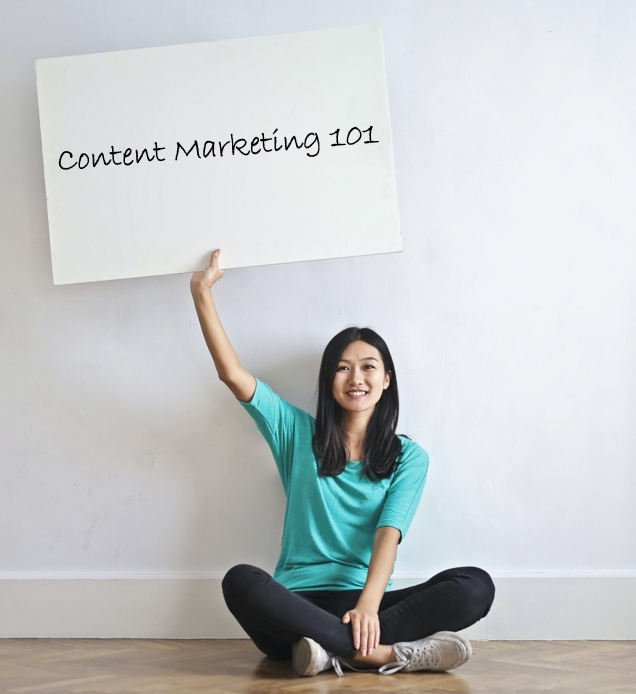 woman holding content marketing sign