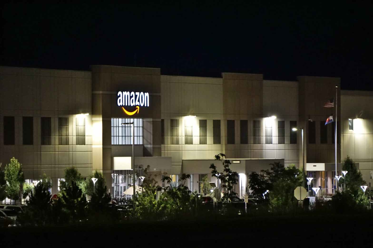 amazon concrete building during night time for an article on amazon product description writing and amazon optimization